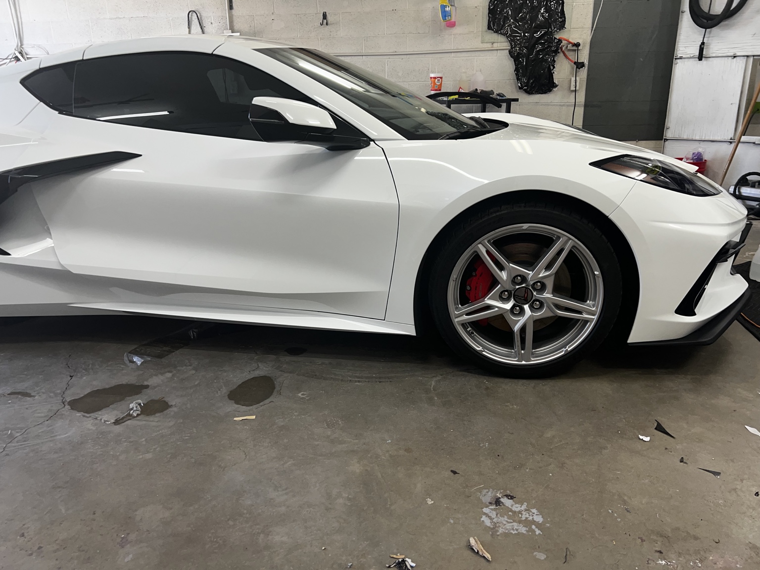 White C8 Corvette during project work at Fine Time To Shine